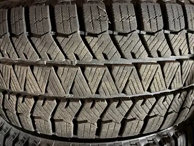 Almost new - used one season less than 500km Details: • Tire: Bridgestone Blizzak WS90 • Size: 205/5...