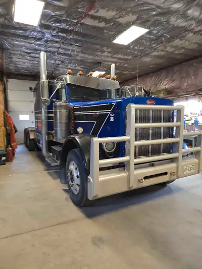 ** Pre- Emission ** Strong C-12 CAT engine. 13 speed, new clutch. Wet line for live bottom. Safety g...