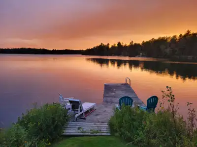 - Waterfront on Spruce Lake, located on a 30 acre forested property with 1400 ft of water frontage -...