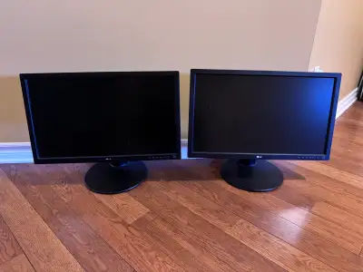 Two LG flat-screen monitors., View more