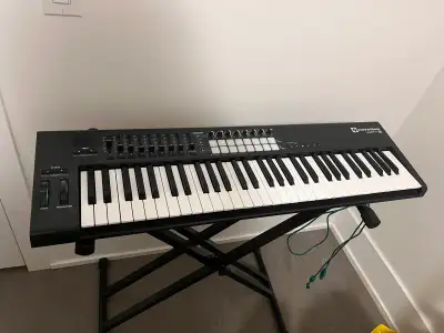 Novation LaunchKey 61 MIDI Keyboard w/ Stand, View more