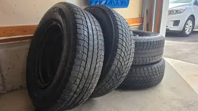 Four Michelin Winter Tires - 235/70 R16 for sale, they are with rims but rims are rusted. Tires were...