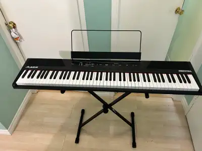 Alesis Recital 88-key digital piano & stand , View more