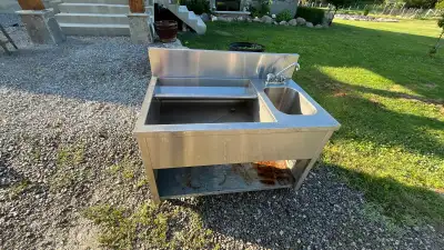 This stainless steel commercial sink is a rugged, industrial-grade piece of equipment perfect for yo...