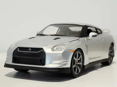 2009 Nissan GT-R silver 1:24 diecast model car, View more