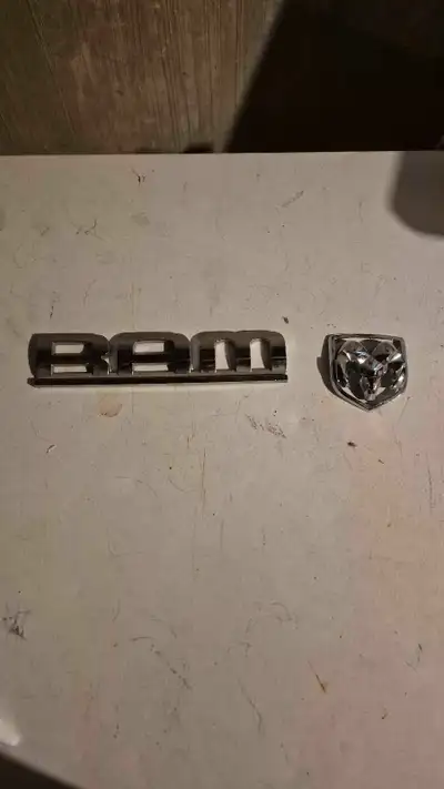 I'm selling a used RAM emblem and logo. These are original parts that were removed from a Dodge RAM...