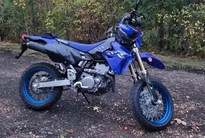 One owner DRZ400SM stored indoors never Dumped one scratch from dealer....swapped out the factory ti...
