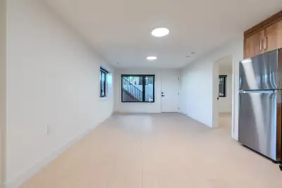 A bright, brand‑new basement suite is available for immediate rent in a newly built two‑storey home...