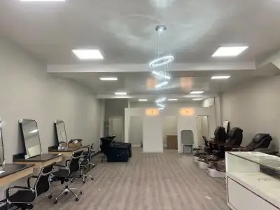 A beautiful salon space is available for rent in a prime, high-visibility location. This is an excel...