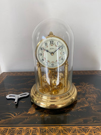 Antique Bentima anniversary 400 day clock.9” tall.