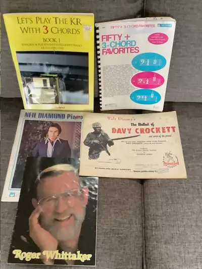 Variety of music books, including Neil Diamond, View more