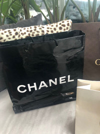 Vuitton Chanel prada Gucci Versace  Dolce Tiffany Holt Renfrew