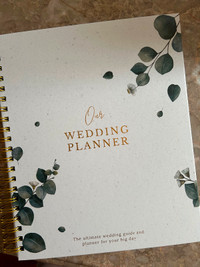 Brand new Wedding Planner book in box.