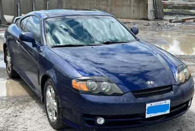 2003 Hyundai Tiburon for sale. many new parts, including new brakes. Not sure what it needs for safe...
