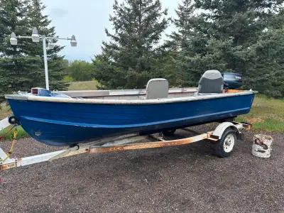 Starcraft 14.5 foot boat with floor. 25HP Yamaha outboard with electric start that runs very well. T...