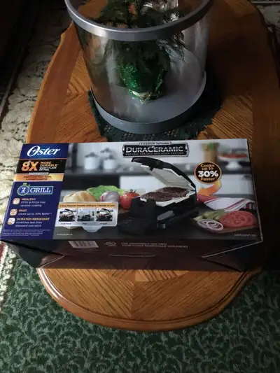 New in the box Oster Grill on EBay for $ 32.99