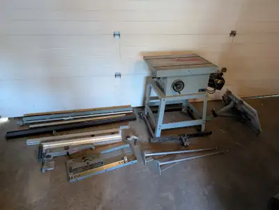 Delta table saw with accessories, View more