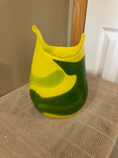 9.5” high art glass vase signed Parm I think. Euc. Price is firm. Google was no help.