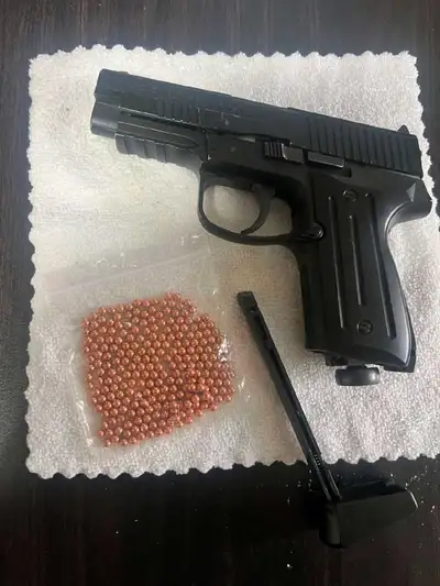 Selling a mint-condition CO2-powered BB pistol modeled after the SIG Sauer platform. Realistic desig...
