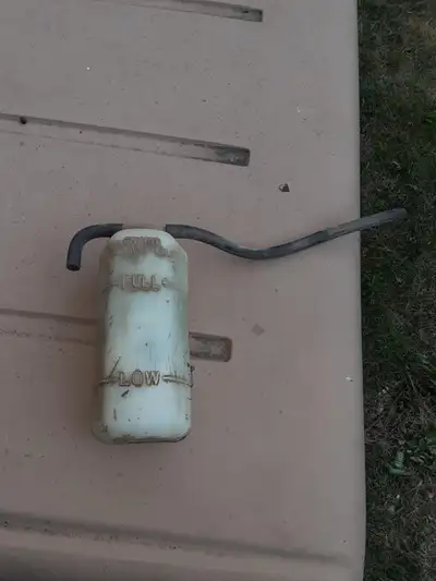 RADIATOR WATER TANK COOLANT OVERFLOW BOTTLE -SAMURAI ’85-’95. BY