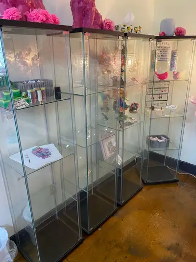 Selling four glass door cabinets. Approximate measurements 15” Wide, 14” Deep, 60” Tall. Asking $50...