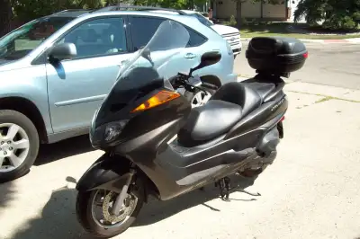 Excellent bike in new condition. Lots of lockable storage under the seat and in the top-box. Plenty...