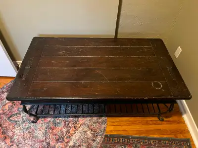 Rustic wood and cast iron coffee table, View more