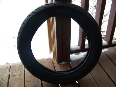 110/90 x 18" Purchased new. Driven approx 1,350 km by mature rider. Rear wheel only. Will include tu...