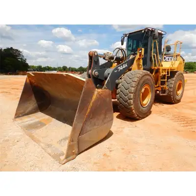I am looking for a Wheel Loader preferably one of the following John Deere 724 744 824 Caterpillar 9...