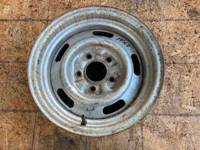 One 14X7 Rally Rim.