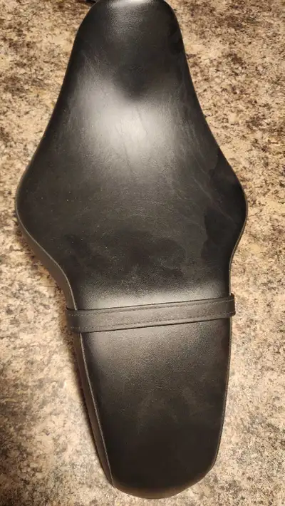 Seat from Honda Stateline. Bottom of seat missing some hardware, as some parts from original seat wa...