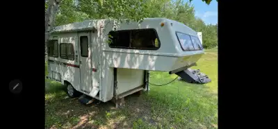 1986 Bigfoot fifth wheel,780-905-1679...5600$ OBO