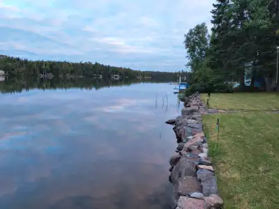 Three season camp on Warnica Lake 30 min from town on paved Rd ( Down Dog Lake Rd) septic, running w...