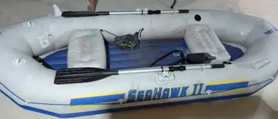 I'm offering an Intex Seahawk II inflatable boat, perfect for a fun day on the lake. This boat is us...