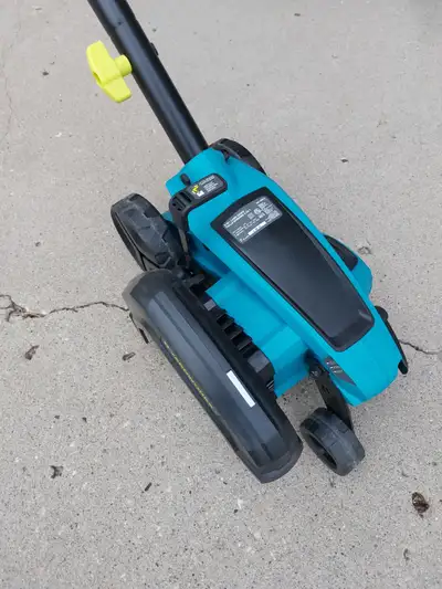Grass Edge Trimmer - electric. Does a marvelous job trimming lawn edges $80.00 - call 306-596-5330 t...