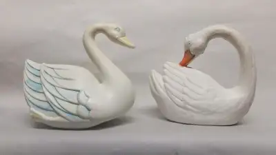 a lovely vintage swan hard plastic in white and blue accents .he rocks to and fro and by doing that...