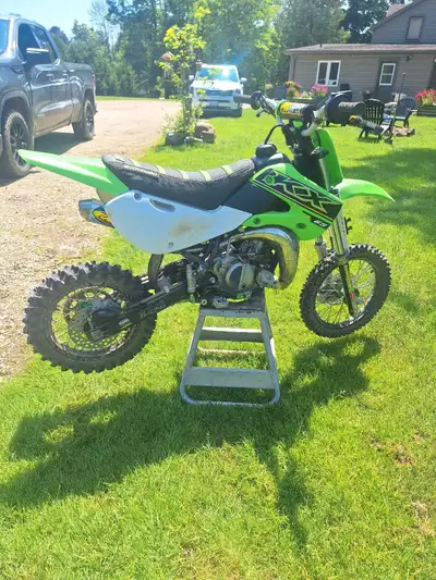 21 kawasaki kx65, in good shape,fmf exhaust, lots of extras