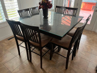 Dining table with hutch and 8 bar style chairs with glass top