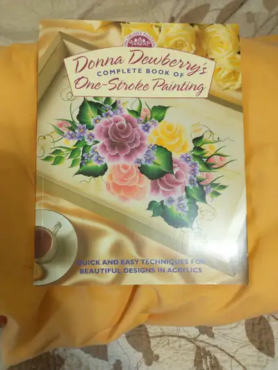 2 books on painting flowers, View more