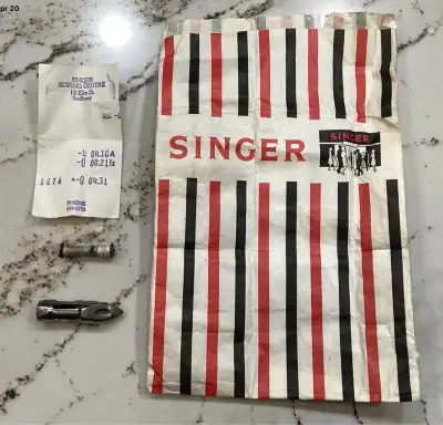New VTG Singer shuttle bullet bobbin case,receipt,bag,bobbin.$50, View more