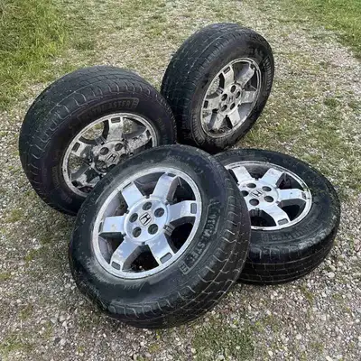 Selling OEM 4 Honda alloy rims (from a 2011 Honda Pilot) with Motomaster Total Terrain tires. Rims a...