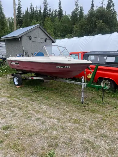 14 ft Lund fibreglass boat with a evenrude 35hp two stroke runs good just did a new impeller looks l...