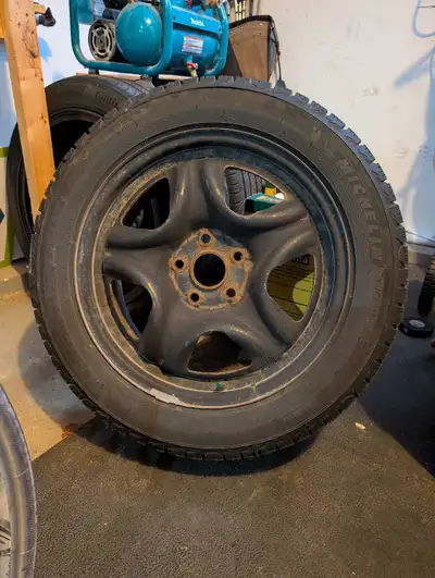 Offering a set of one year old Michelin X-Ice winter tires, size 215/55R17 98H, ready to tackle thos...