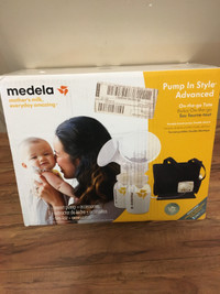 BRAND NEW NEVER OPENED MEDELA BREAST PUMP