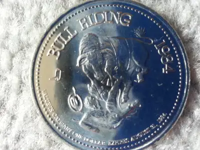 1984 CALGARY STAMPEDE COLLECTOR DOLLAR. Salute to Bull Rider's and the early pioneer of Bull Riding...