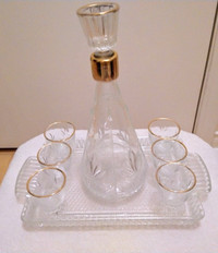 Vintage Glass decanter with glasses and a tray