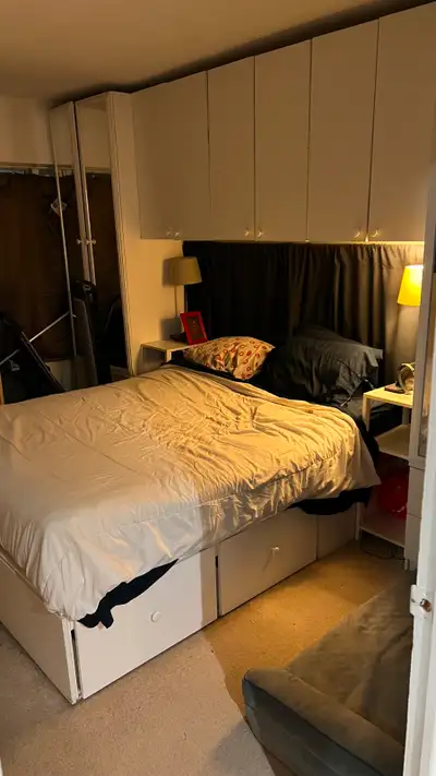 One room in a 1 Bed + Den Apartment (King & Church)