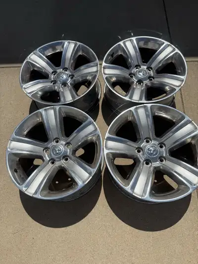 Selling full set of four ram 1500 sport rims 20x9 chrome finish +19 offset 5x139.7 or 5x5.5” bolt pa...