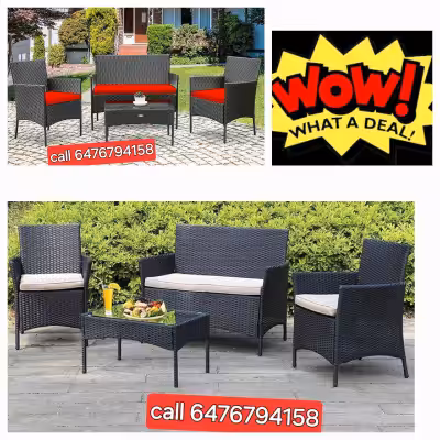 This brand new box packed four-piece outdoor patio set features a stylish, dark wicker design, inclu...