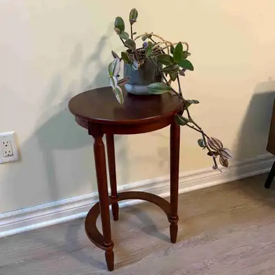 Elegant round wood accent/pedestal table, View more